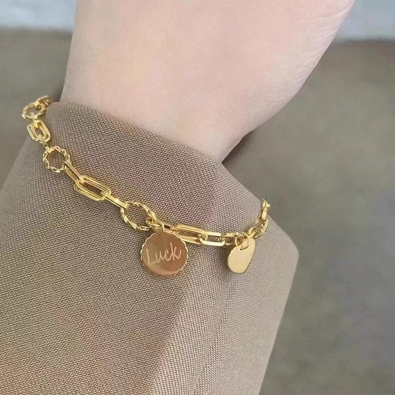 Luck Disc & Heart Bracelet - A Stylish Bracelet in Sweet-Cool Style